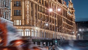 building wrapped with string lights during night time